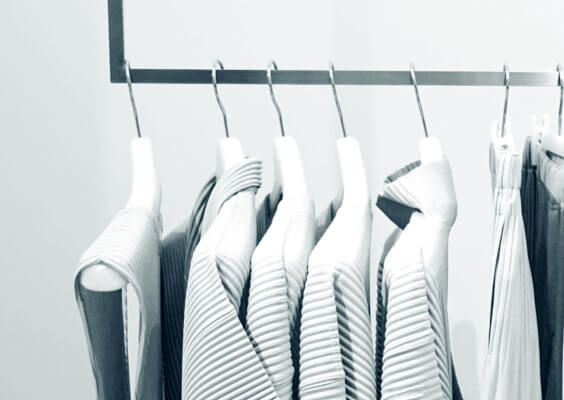 a group of white clothes on a line